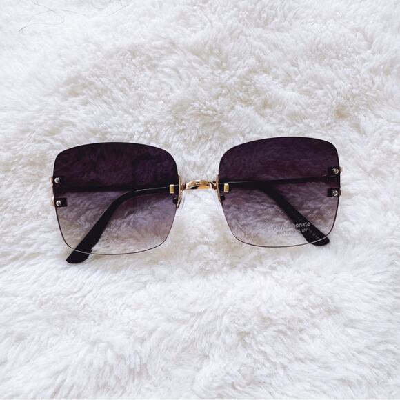 Laurel Clear Black Rimless Sleek Sunglasses - Picture 1 of 11